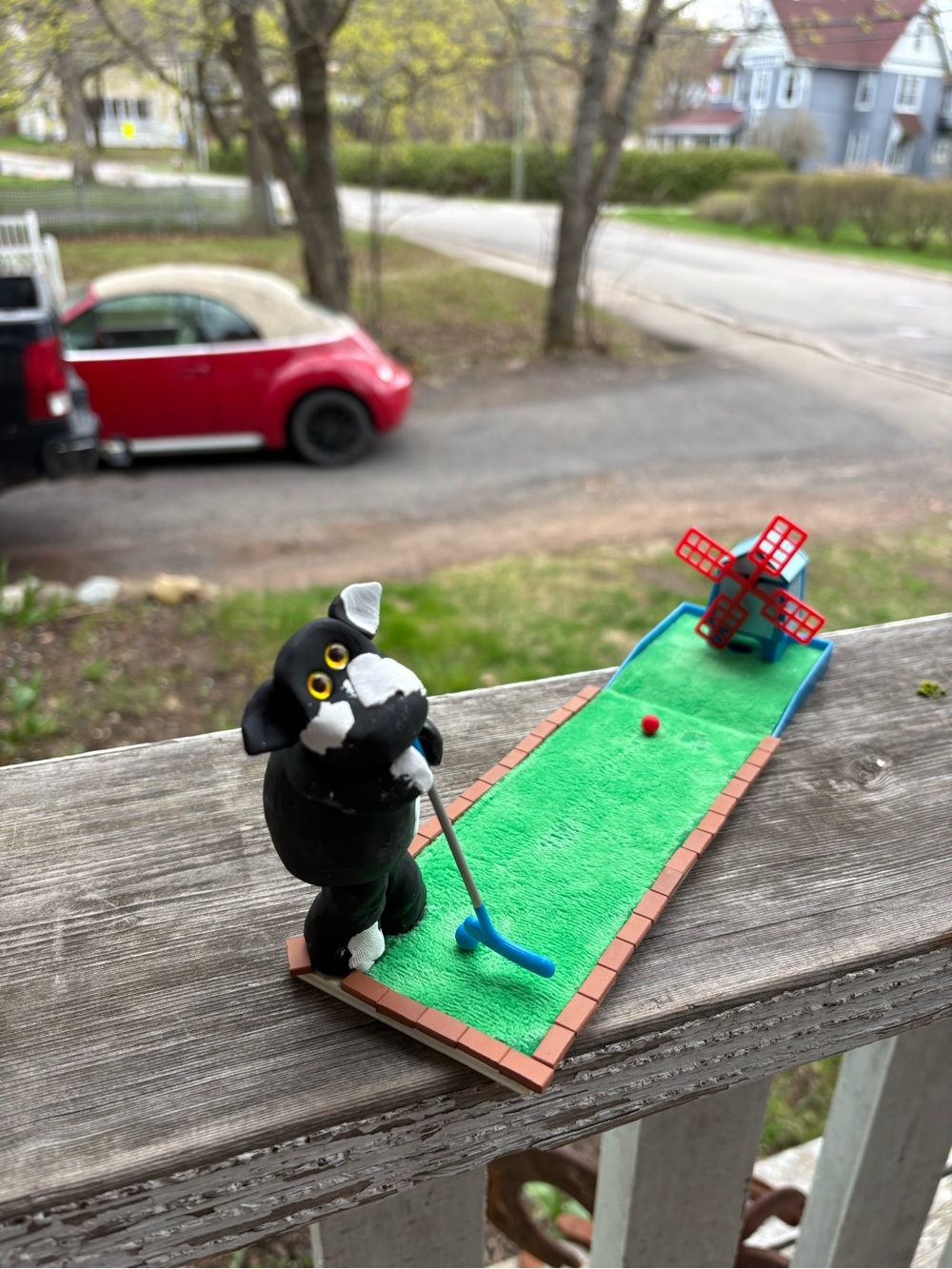Miniature Windmill Putting Green decor - Black cow